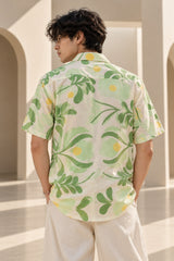 Off-white Hawaiian shirt with bold green and yellow botanical leaf art print, Cuban collar, relaxed fit, men India