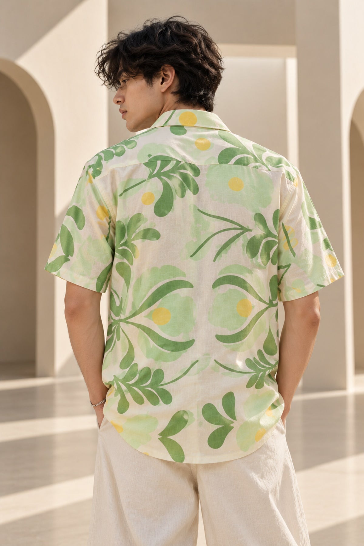 Off-white Hawaiian shirt with bold green and yellow botanical leaf art print, Cuban collar, relaxed fit, men India