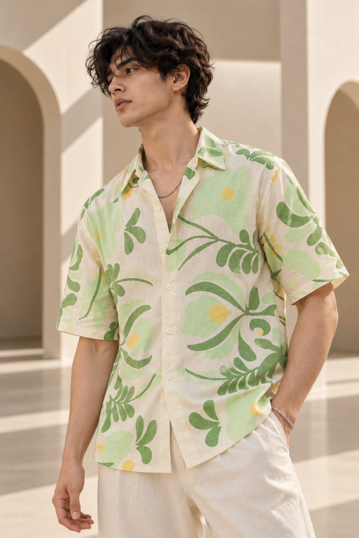 Off-white Hawaiian shirt with bold green and yellow botanical leaf art print, Cuban collar, relaxed fit, men India