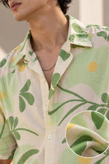Off-white Hawaiian shirt with bold green and yellow botanical leaf art print, Cuban collar, relaxed fit, men India