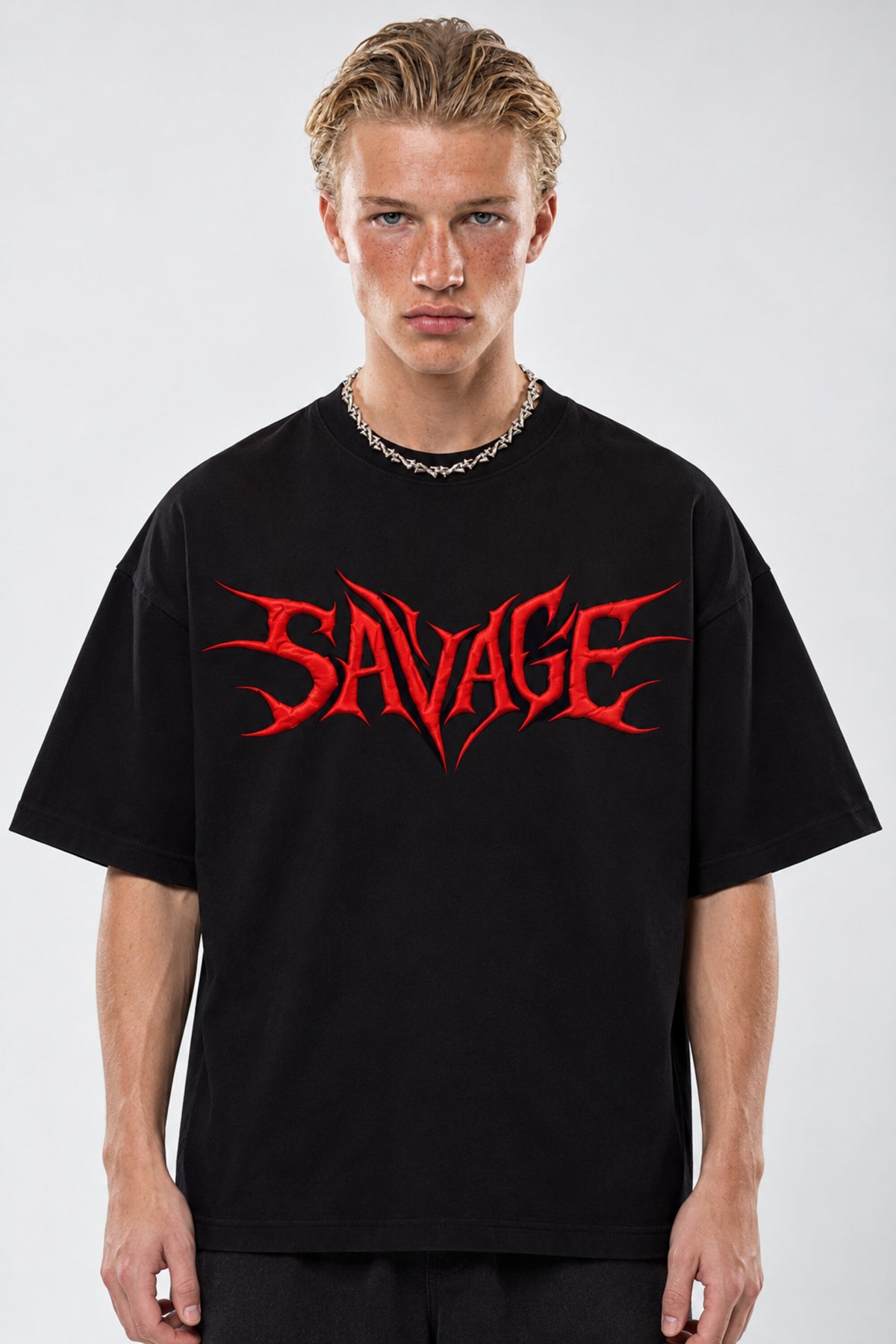 Black oversized tshirt with SAVAGE in bold red metal gothic font on chest, drop shoulder boxy fit, men India