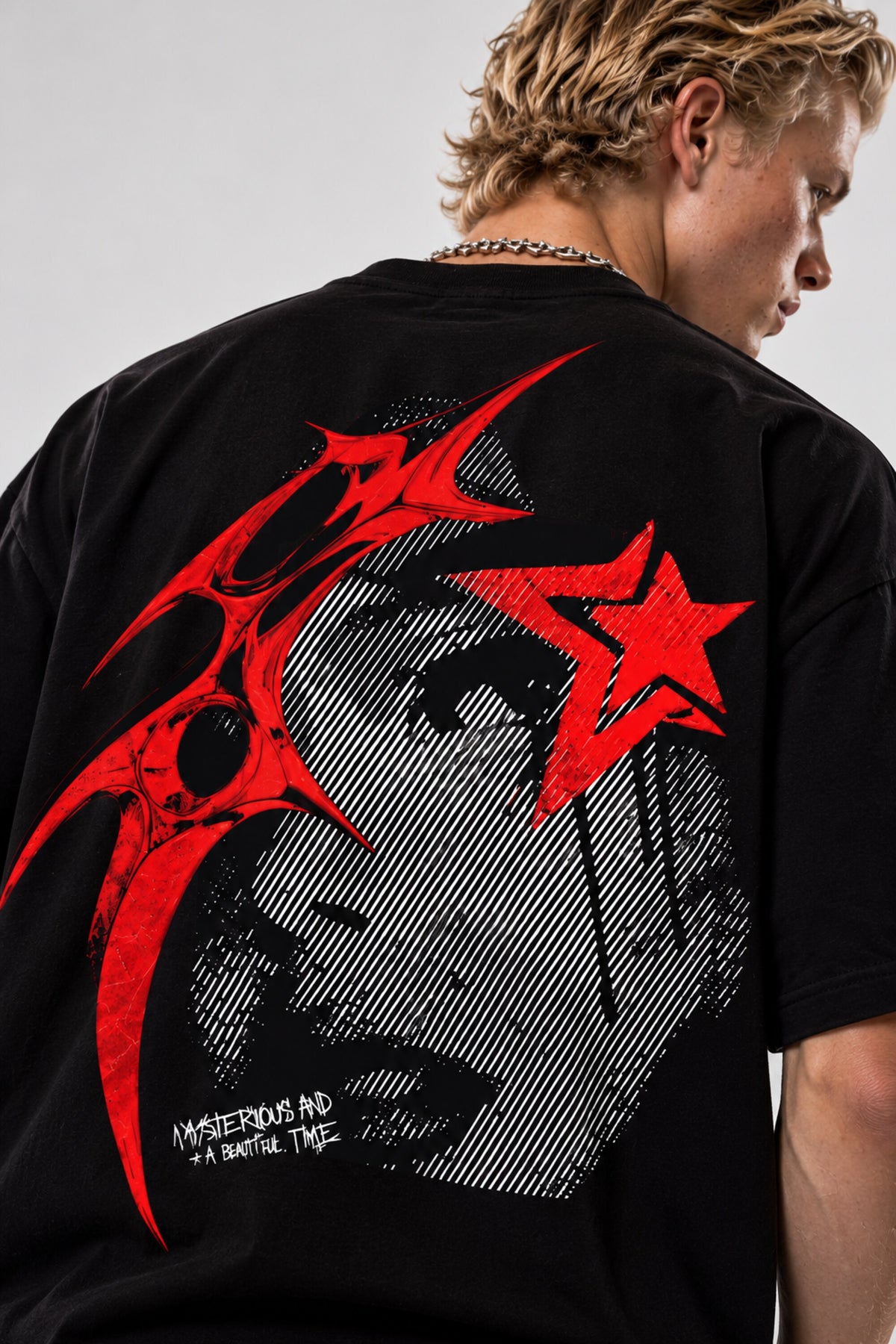 Black oversized tshirt with SAVAGE in bold red metal gothic font on chest, drop shoulder boxy fit, men India