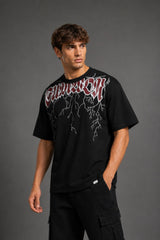 Guardian Design black oversized t-shirt with a bold red and white lightning bolt graphic print. Shot on a model, showcasing the relaxed, streetwear fit.