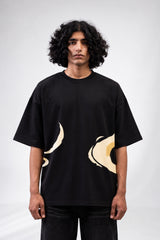 Black oversized tshirt with vibrant full-back Hanuman warrior illustration in orange red and gold, drop shoulder boxy fit, men India