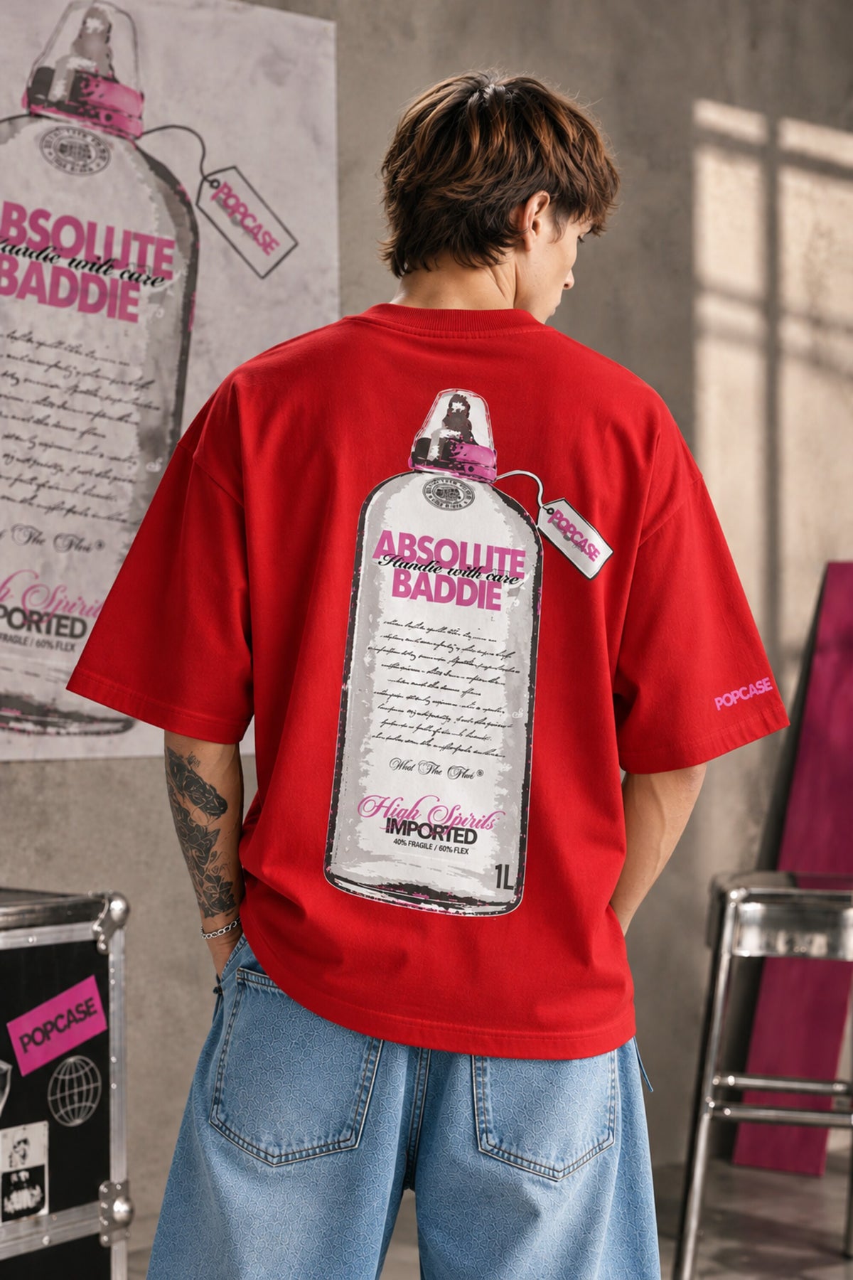 White oversized tshirt with High Spirits pink cursive front and Absolute Baddie vodka bottle back print, drop shoulder boxy fit, men India - red