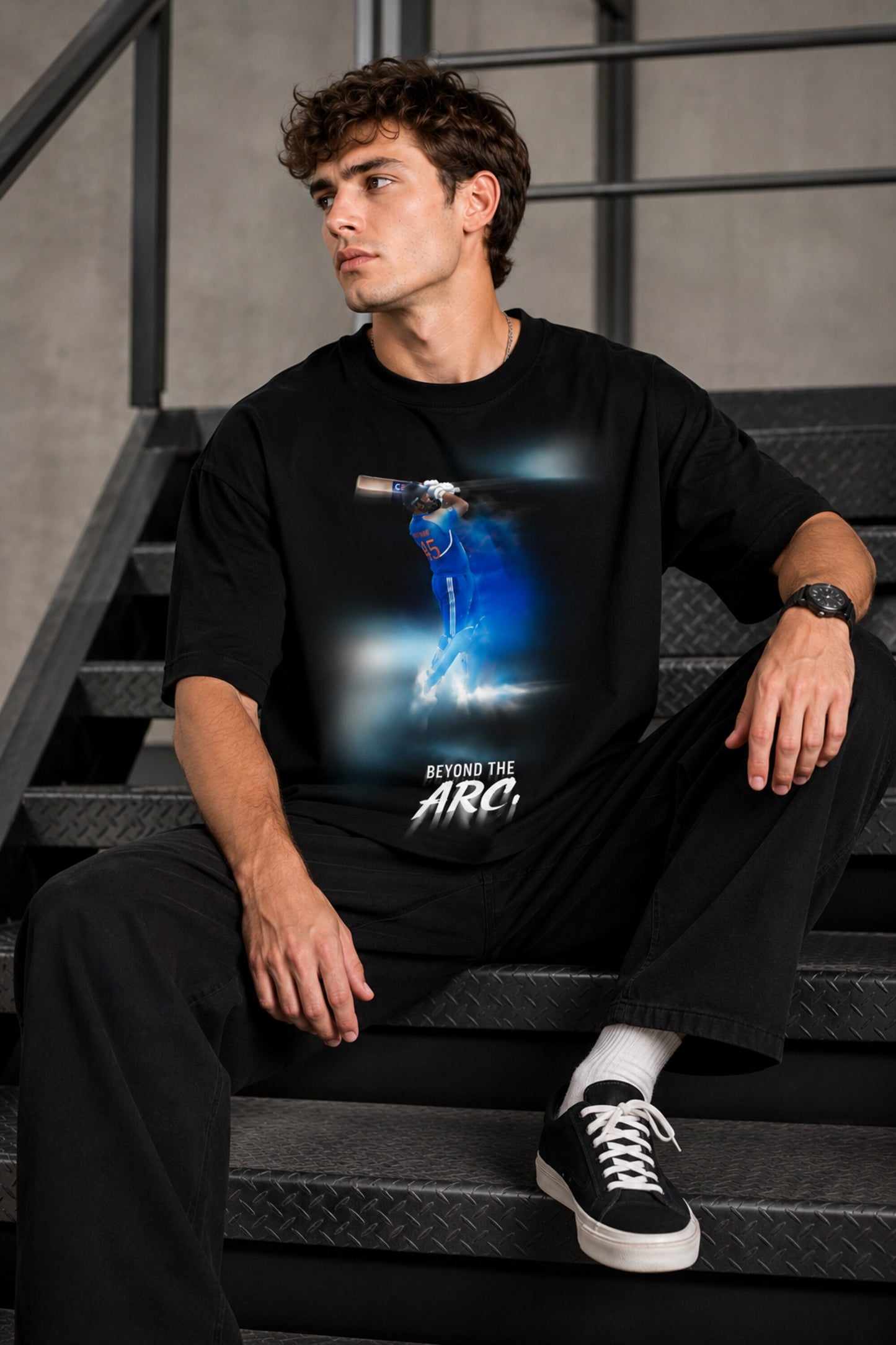 Black oversized t-shirt with cinematic Rohit Sharma Hitman batting photo blue glow Beyond the ARCi bold text 220 GSM DTF print