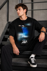 Black oversized t-shirt with cinematic Rohit Sharma Hitman batting photo blue glow Beyond the ARCi bold text 220 GSM DTF print