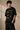 Beige oversized t-shirt with 'HORCRUXES' graphic and iconic Harry Potter items, showcasing premium cotton fabric and relaxed fit.