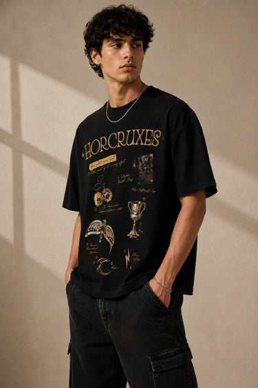 Beige oversized t-shirt with 'HORCRUXES' graphic and iconic Harry Potter items, showcasing premium cotton fabric and relaxed fit.