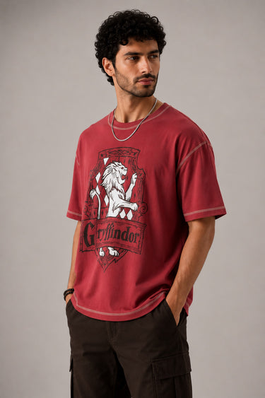 Red Thread & Co. oversized t-shirt featuring a detailed Gryffindor crest graphic with a lion, designed for a trendy streetwear look.