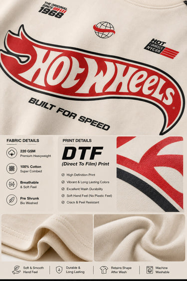 Beige oversized t-shirt with large red and black HOT WHEELS 'Original Since 1968' graphic print on the front, showcasing premium fabric texture.