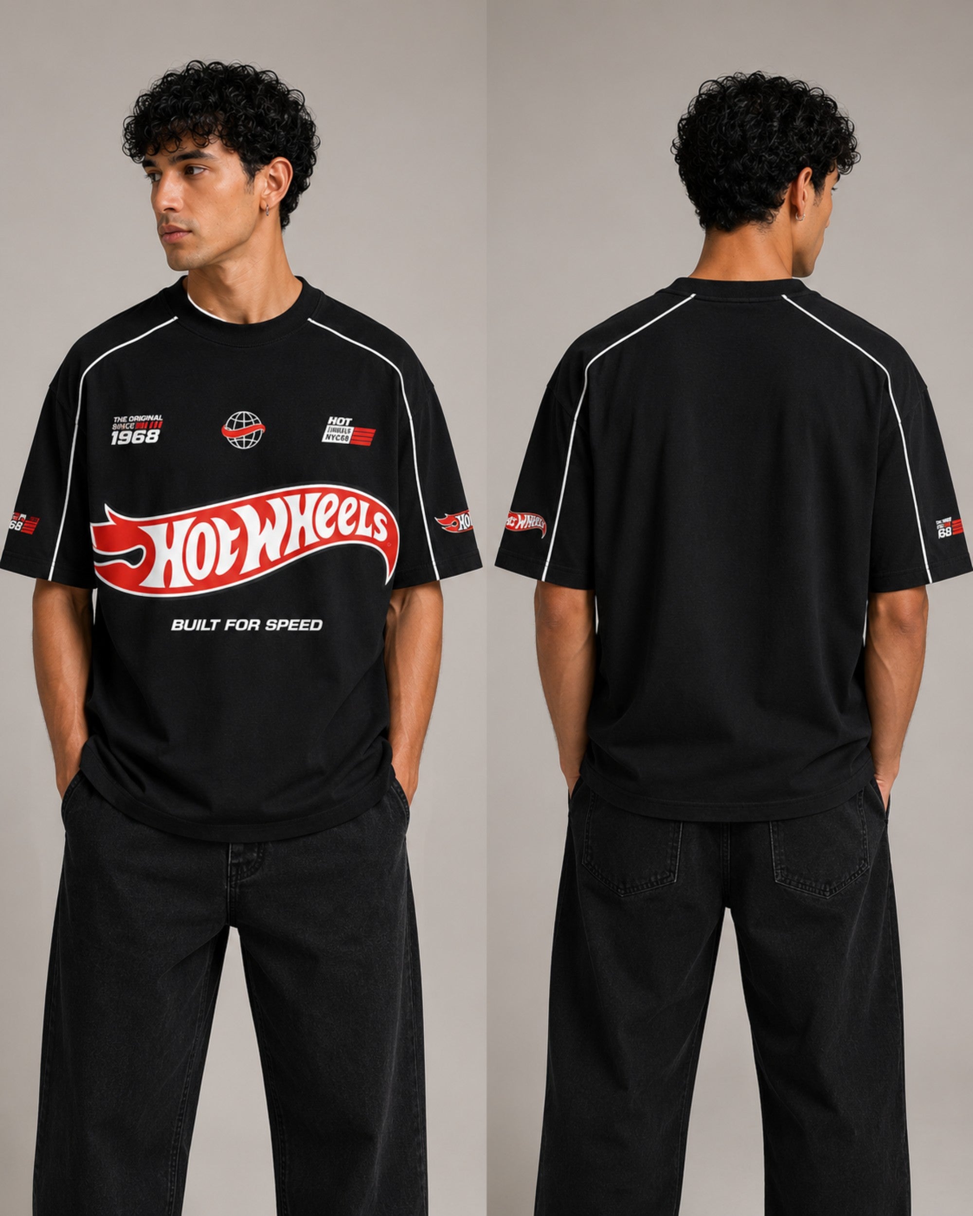 Beige oversized t-shirt with large red and black HOT WHEELS 'Original Since 1968' graphic print on the front, showcasing premium fabric texture. - black