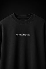Black oversized t-shirt with i'm doing it my way minimalist white text chest print