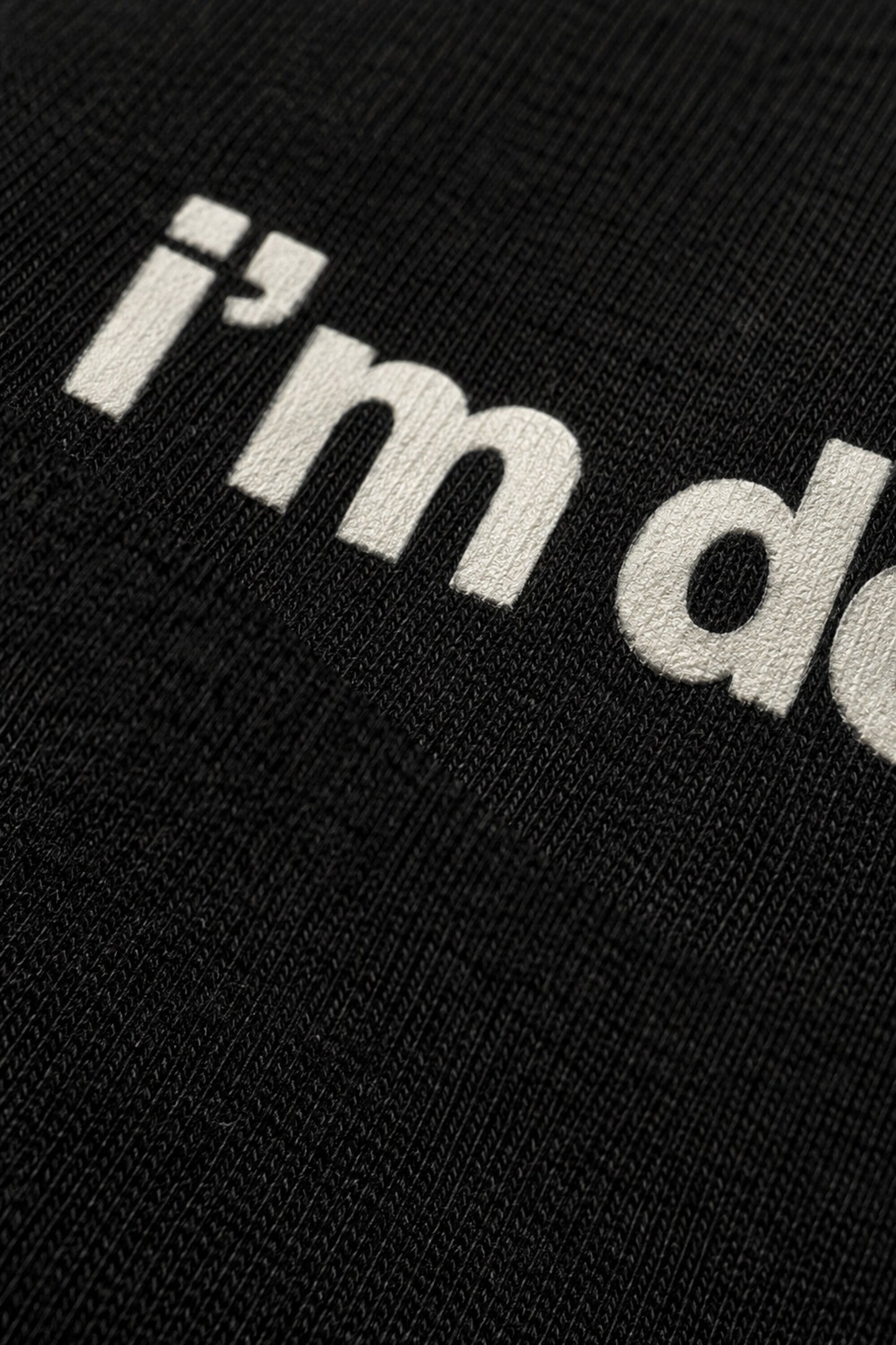 Black oversized t-shirt with i'm doing it my way minimalist white text chest print