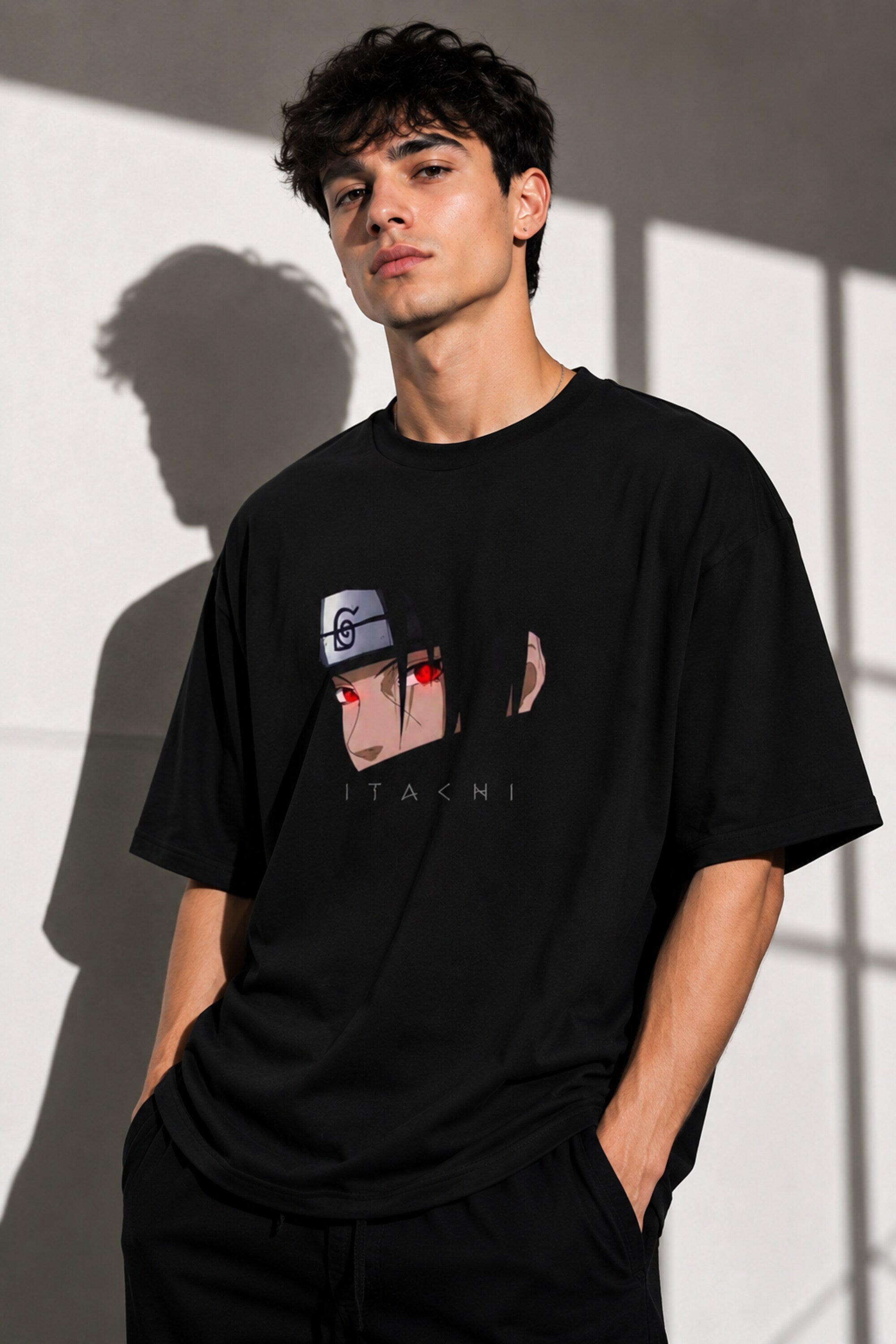 Itachi oversized black t-shirt with subtle ITACHI name print on back, minimalist anime streetwear India