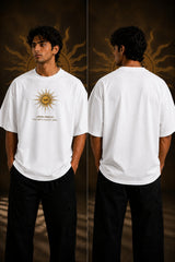 Model wearing a black KARMA oversized t-shirt with a golden sun graphic and the Sanskrit phrase 'कर्मण्येवाधिकारस्ते' (Your right is to action alone). - white