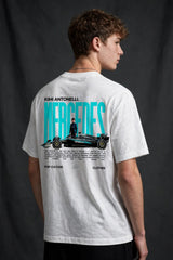Model wearing white POPCASE Kimi Antonelli Mercedes oversized t shirt with teal MERCEDES Petronas F1 car back graphic and bio text