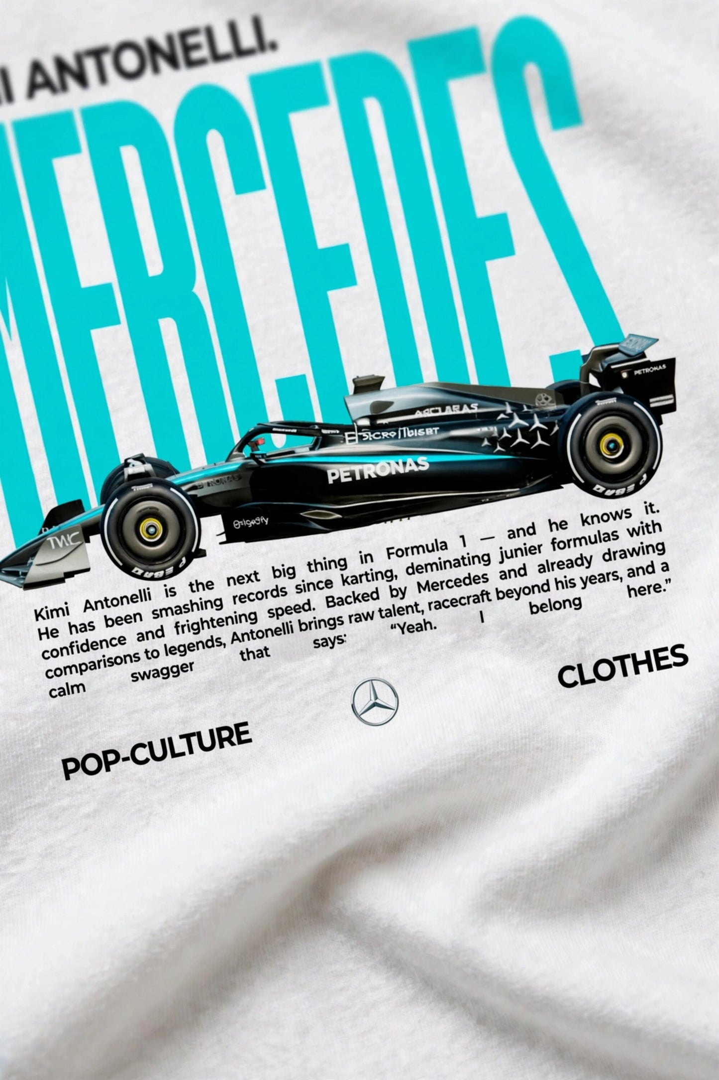 Model wearing white POPCASE Kimi Antonelli Mercedes oversized t shirt with teal MERCEDES Petronas F1 car back graphic and bio text