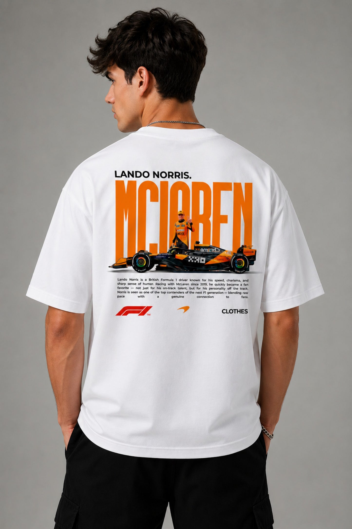 Model wearing white POPCASE Lando Norris McLaren oversized t shirt with orange speed mark logo on left chest