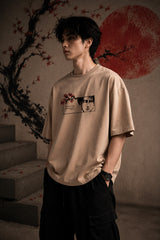Beige oversized tshirt with Levi Ackerman manga face cherry blossom art and Give Up Your Dreams and Die quote from Attack on Titan