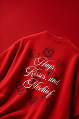 Red oversized tshirt with Hugs Kisses and Mischief white cursive script and hand-drawn hearts back print, boxy fit, men India