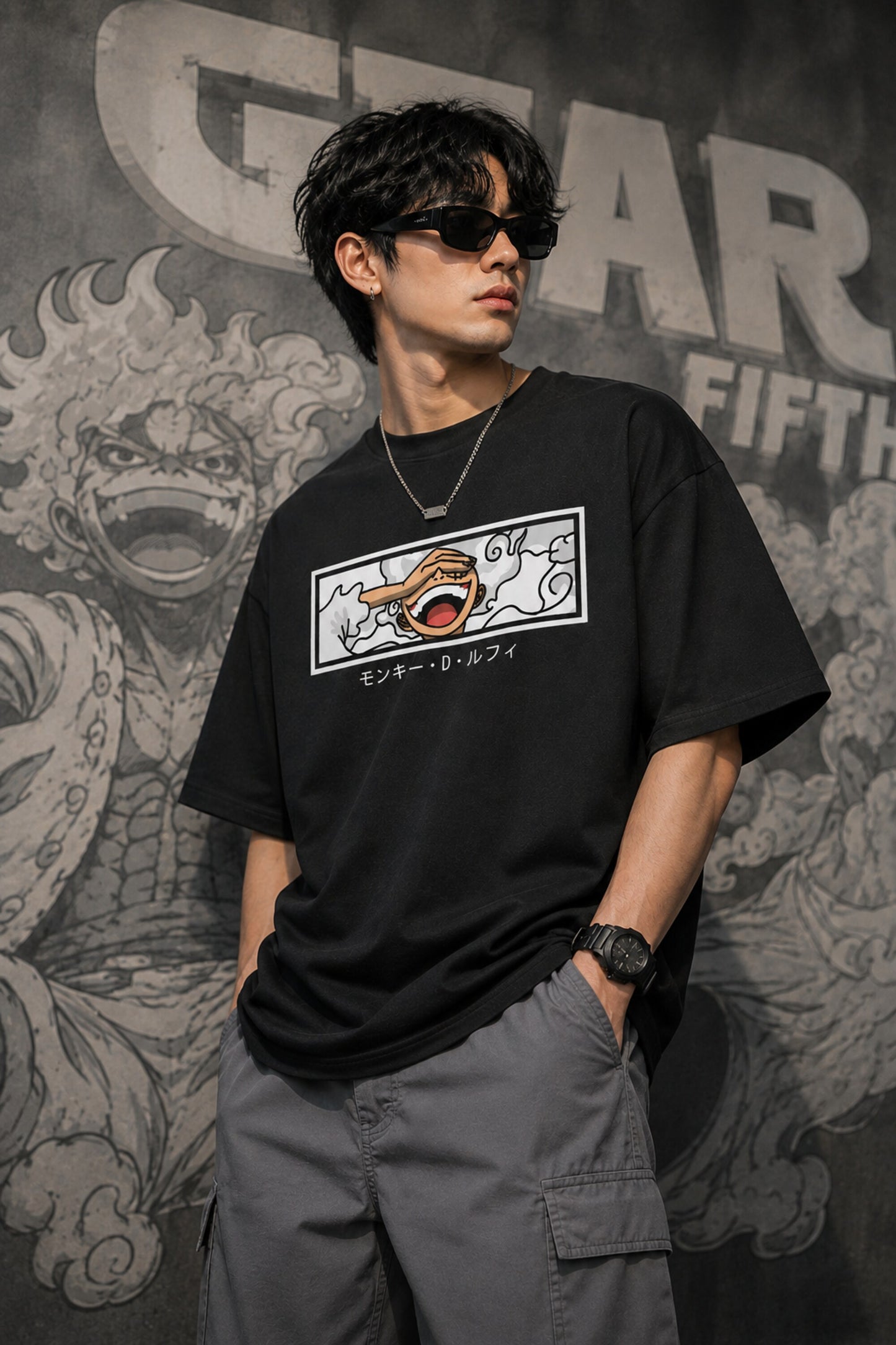 Black oversized t-shirt with Monkey D Luffy Gear 5 face graphic and Japanese text, One Piece anime streetwear India