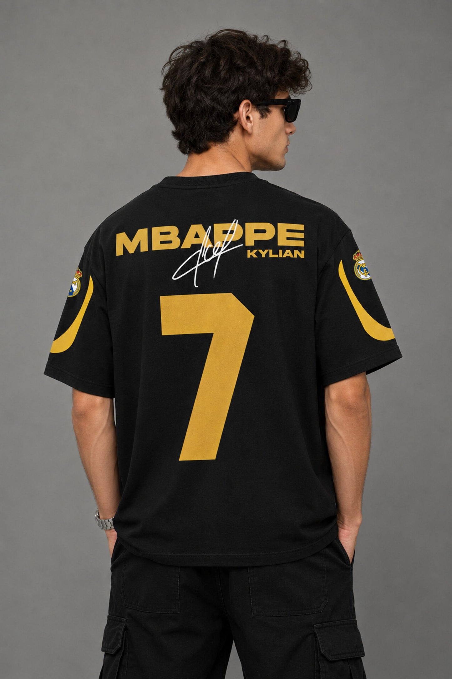 Kylian Mbappe Real Madrid number 7 black oversized t-shirt with gold print and signature