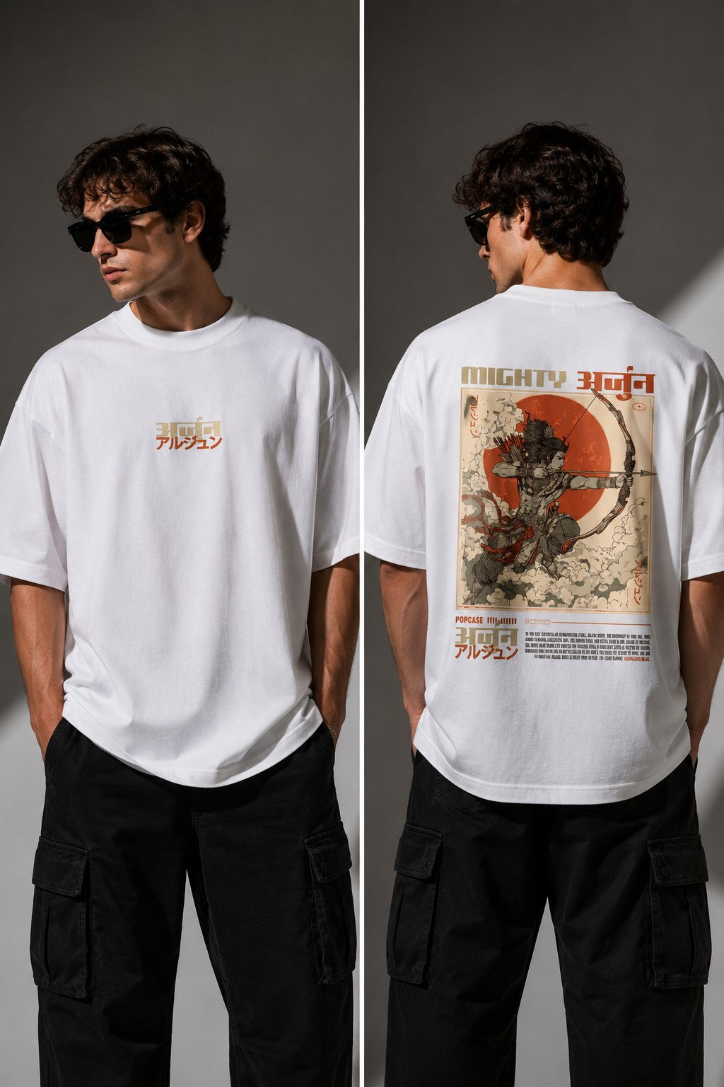 Black MIGHTY ARJUN oversized t-shirt featuring distressed Hindi script graphic in beige and orange, highlighting streetwear style. - white