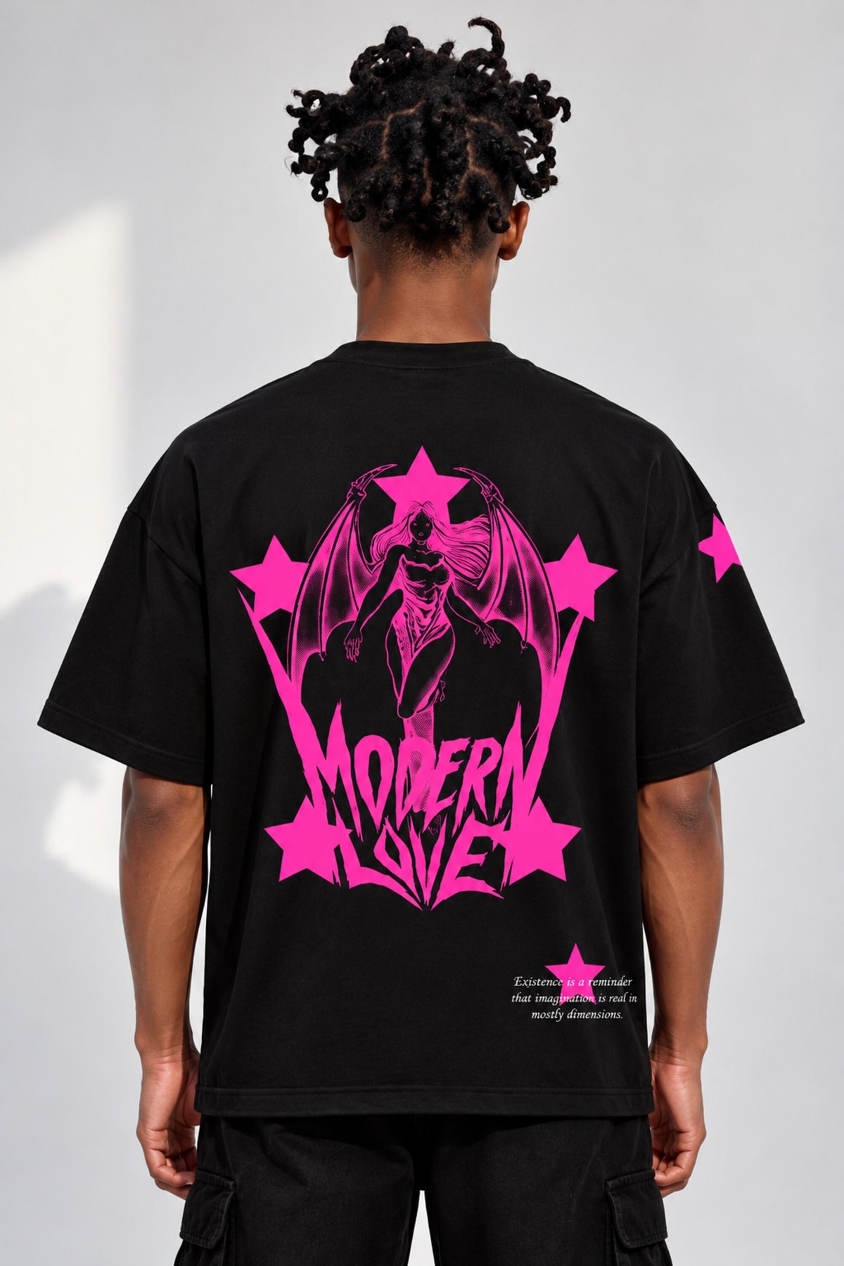 Black oversized tshirt with Modern Love electric pink metal rock font on chest and pink star on sleeve, drop shoulder boxy fit, men India