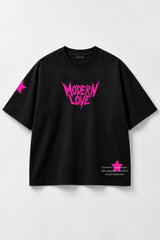 Black oversized tshirt with Modern Love electric pink metal rock font on chest and pink star on sleeve, drop shoulder boxy fit, men India