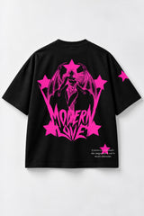 Black oversized tshirt with Modern Love electric pink metal rock font on chest and pink star on sleeve, drop shoulder boxy fit, men India