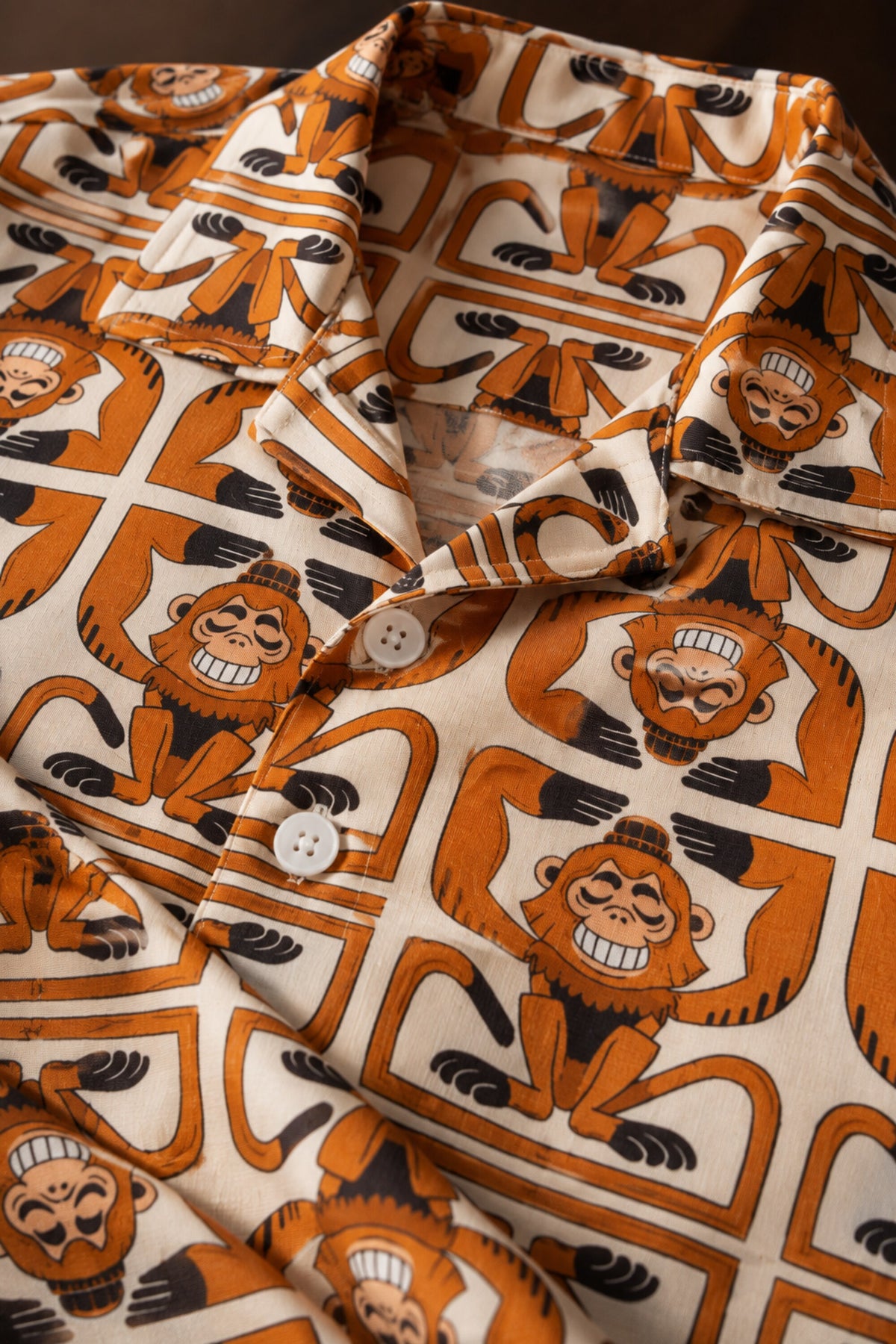 Orange brown Hawaiian shirt with all-over geometric monkey face totem art print, Cuban collar, men India