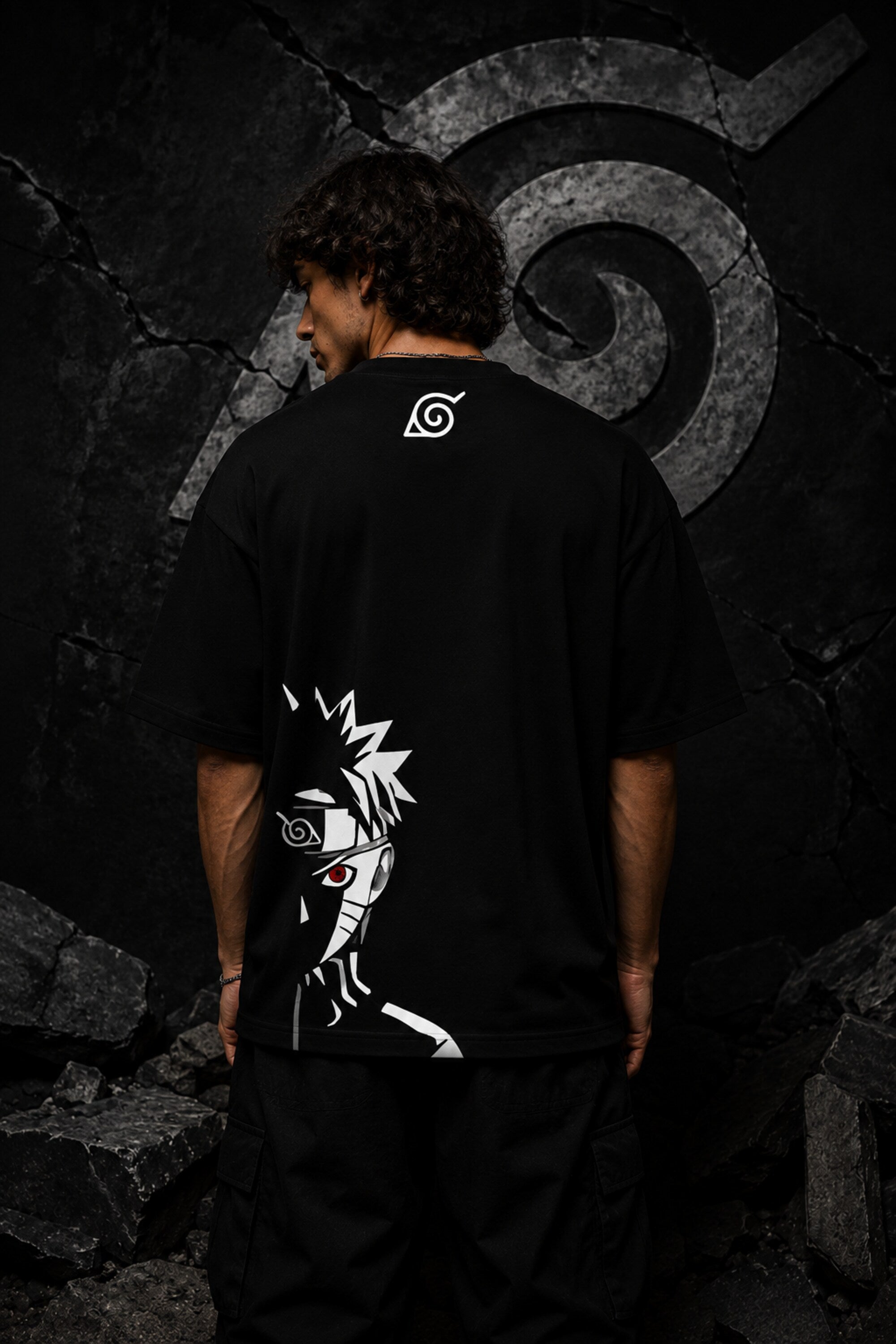 Black oversized t-shirt with Naruto logo in white brushstroke lettering and Japanese text, anime streetwear India