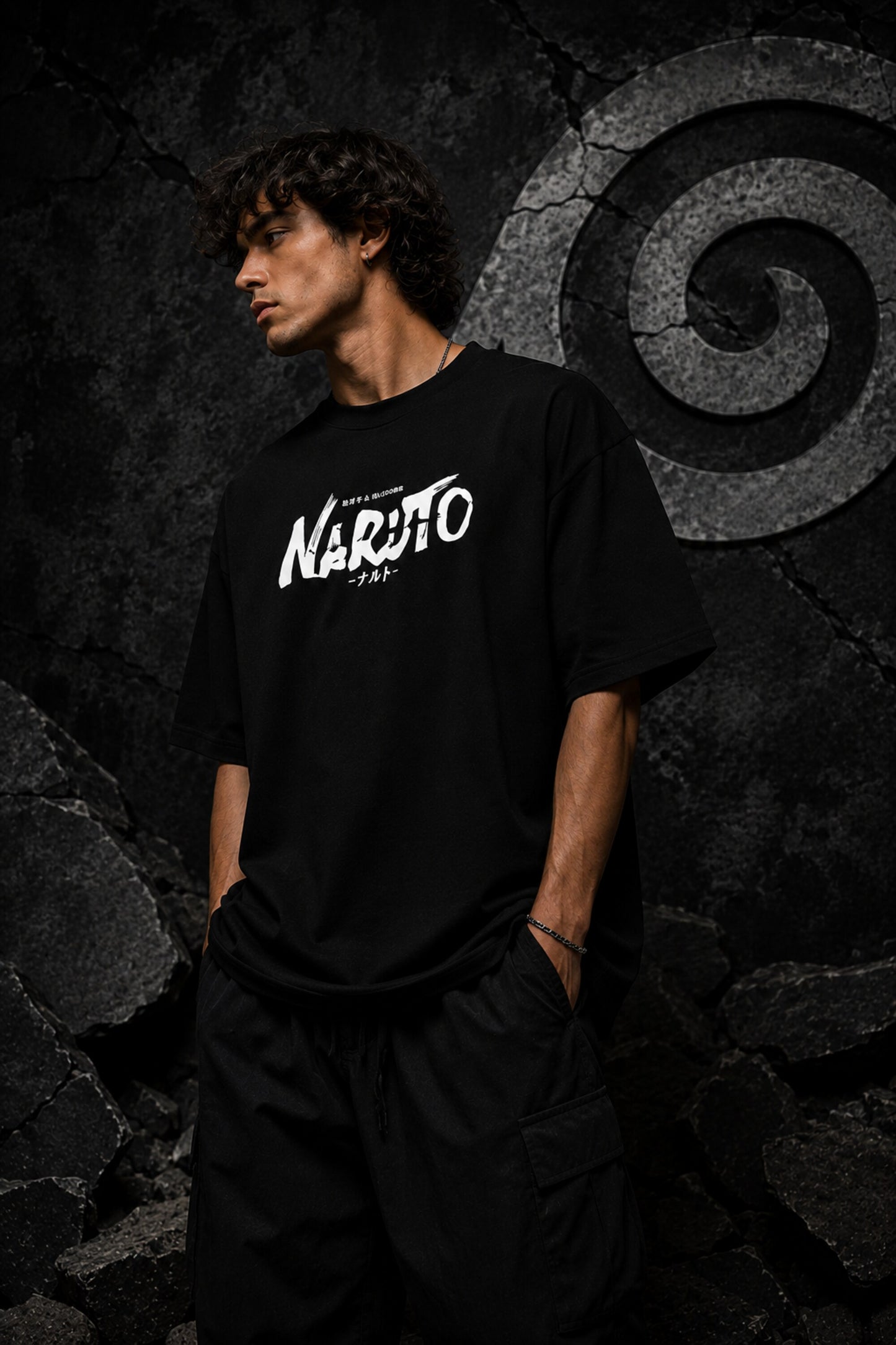 Black oversized t-shirt with Naruto logo in white brushstroke lettering and Japanese text, anime streetwear India