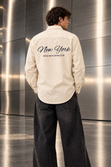 Full sleeve shirt with New York cursive on back and chest embroidery in black blue and cream, 100% cotton relaxed fit, men India - cream