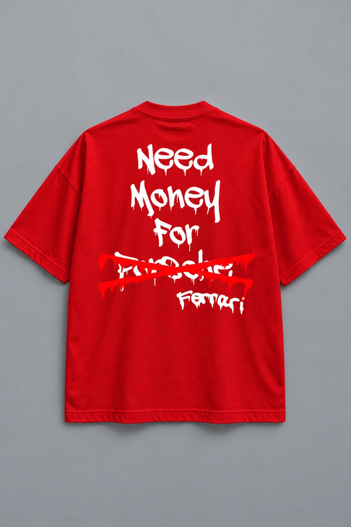 White oversized tshirt with Need Money for Ferrari bold drip graffiti text on back in black and red, drop shoulder boxy fit, men India - red