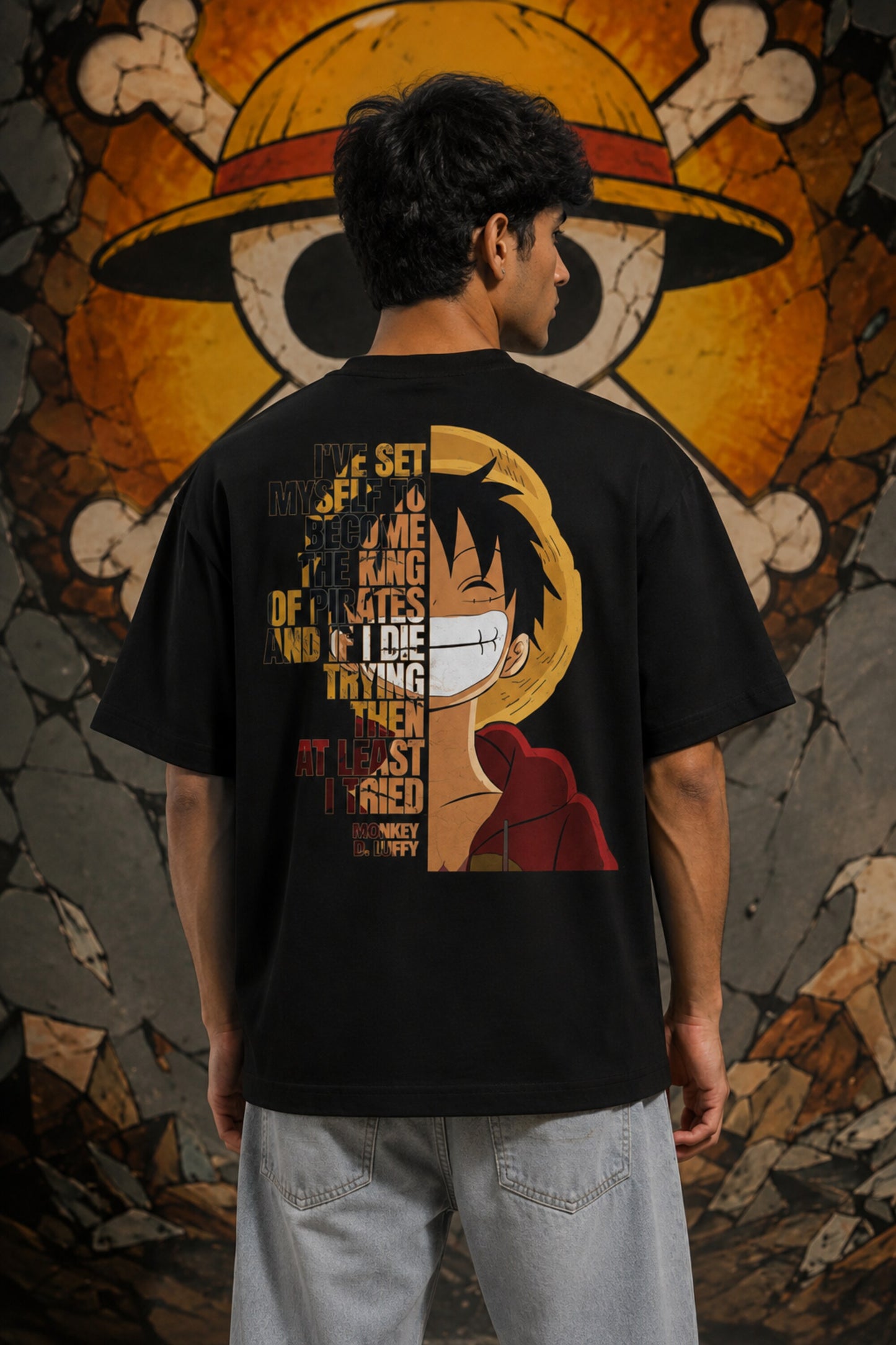 Black oversized tshirt with The Pirate King Luffy straw hat logo parody chest print from One Piece anime