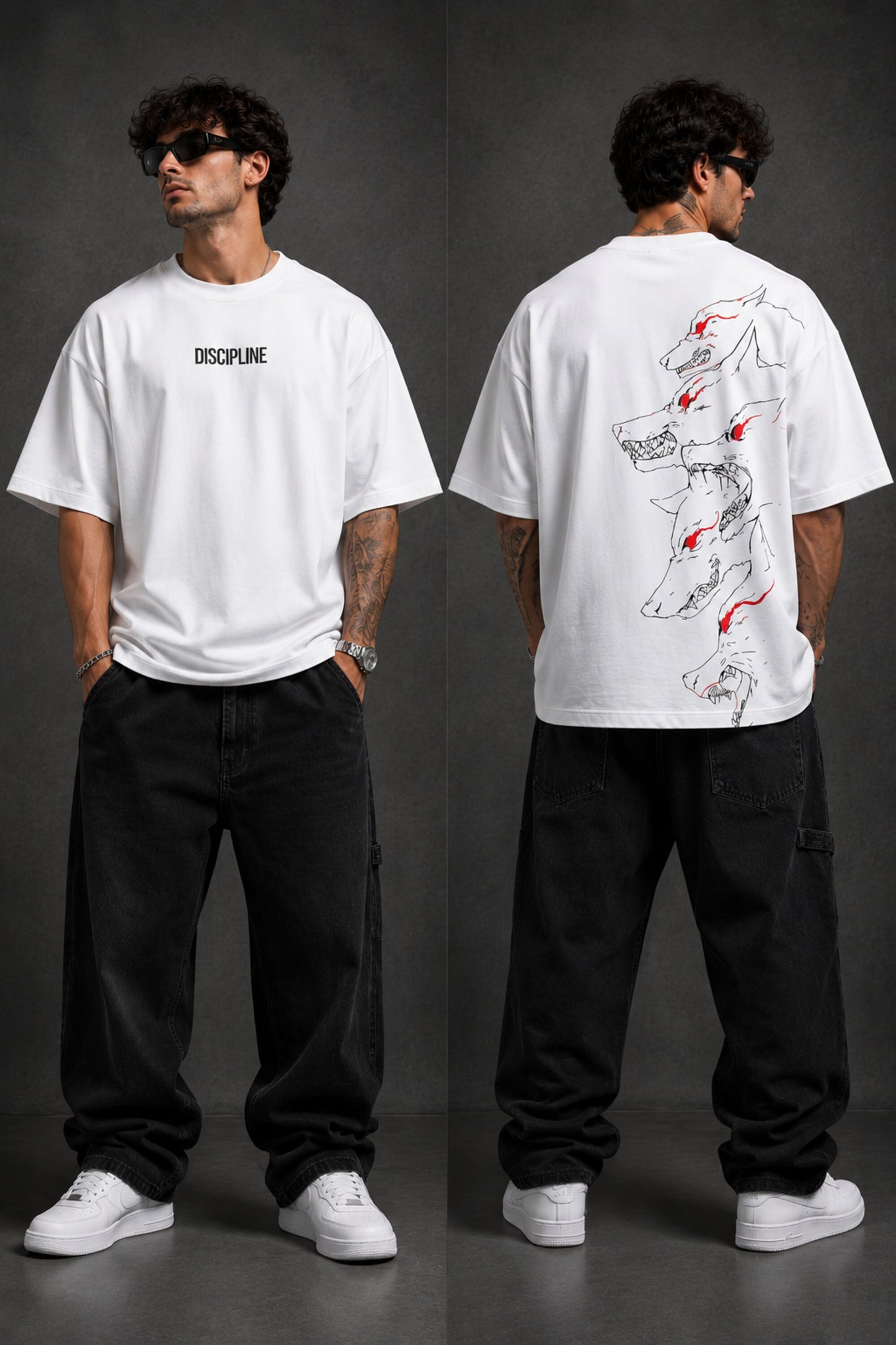 Man wearing a black DISCIPLINE WILD WOLF oversized t-shirt with white 'DISCIPLINE' text, dark wash jeans, and white sneakers, sitting on stairs. - white