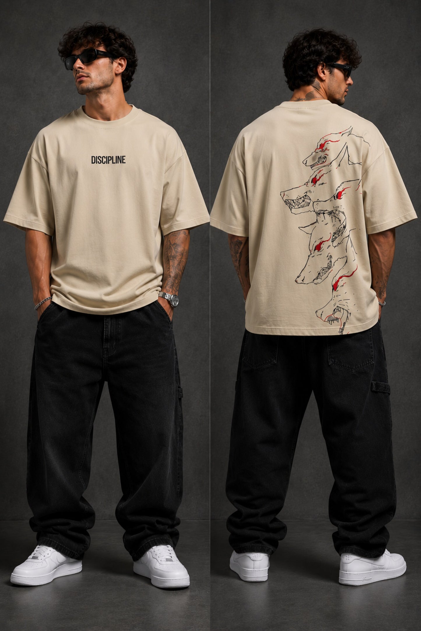 Man wearing a black DISCIPLINE WILD WOLF oversized t-shirt with white 'DISCIPLINE' text, dark wash jeans, and white sneakers, sitting on stairs. - beige