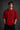 Red Nordic Heritage oversized t-shirt with black Viking-inspired graphic print on the front and back. Close-up shows DTF print quality and fabric texture. - red