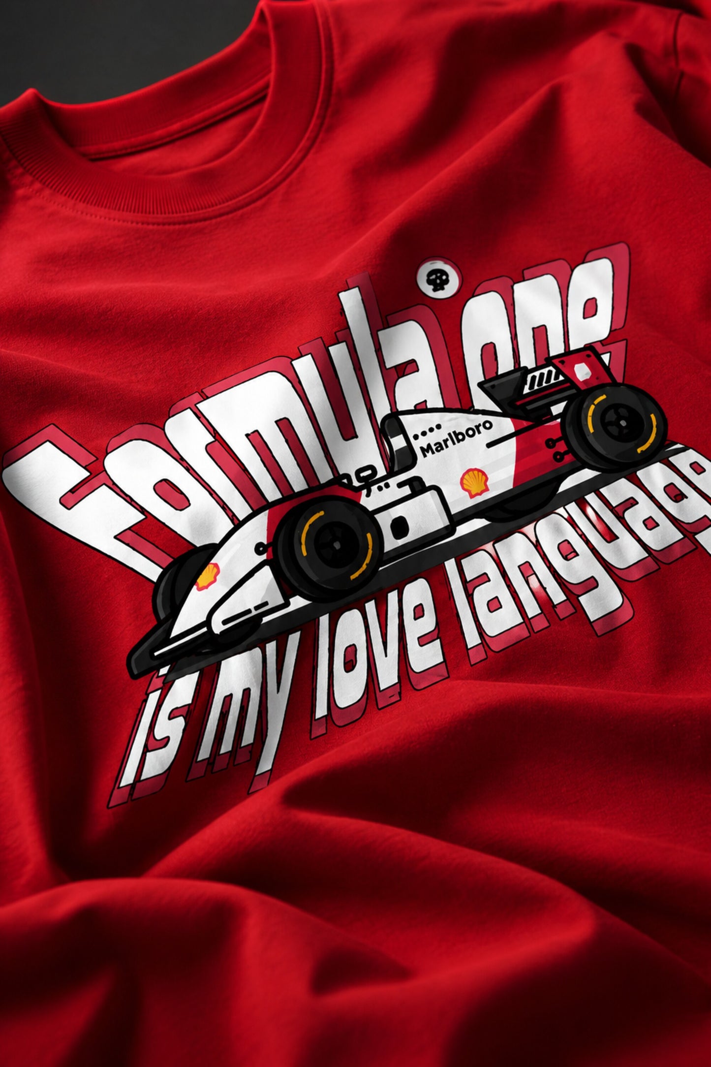 Red POPCASE oversized tshirt with Keep Pushing flaming F1 tire on front and Formula One is my love language vintage McLaren race car graphic on back