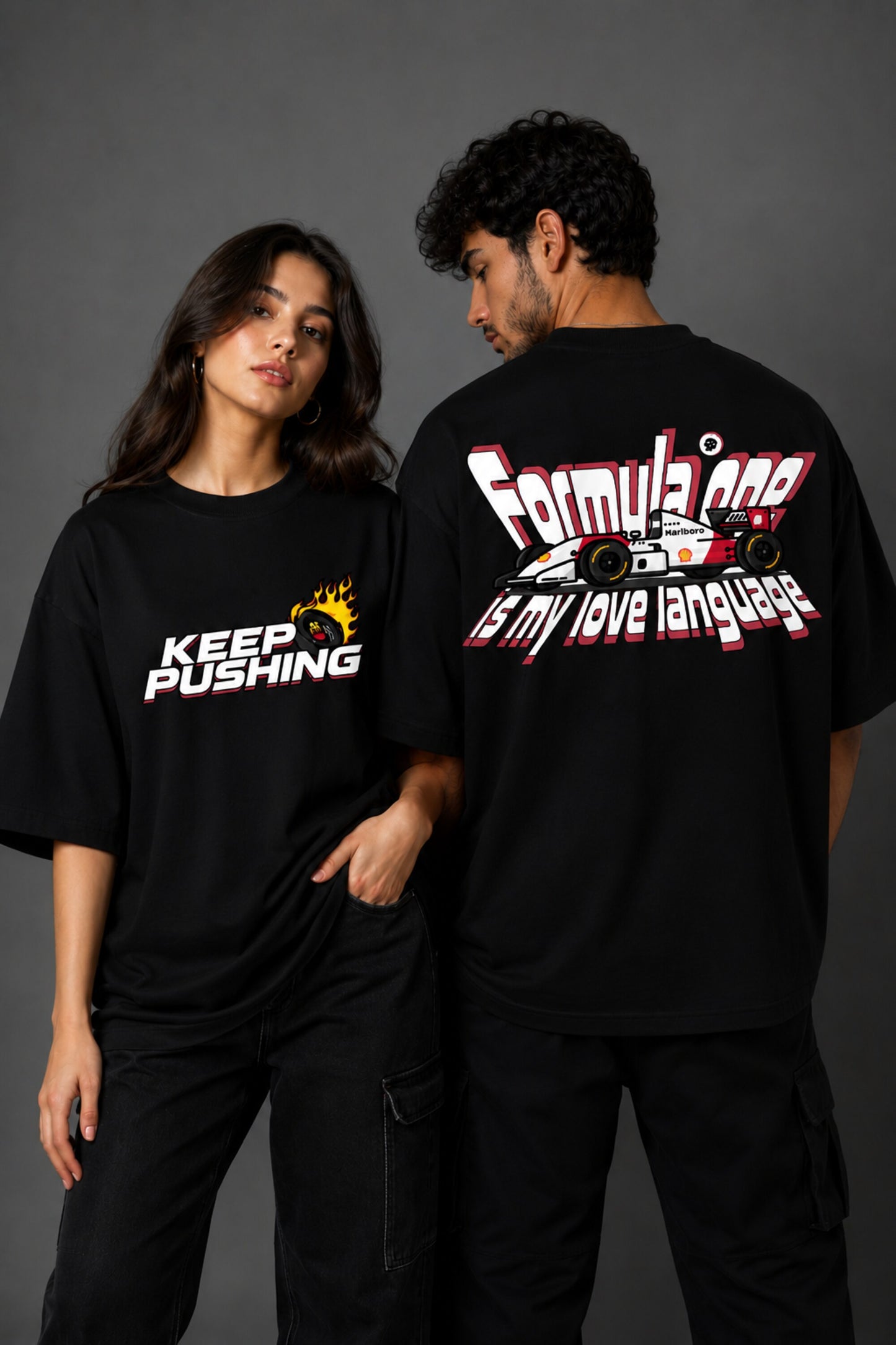 Red POPCASE oversized tshirt with Keep Pushing flaming F1 tire on front and Formula One is my love language vintage McLaren race car graphic on back