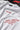 White sweatshirt with red text and 'POPCASE' branding on a black background with 'F1' logo.