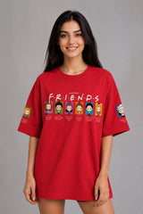 Person wearing a red 'Friends' t-shirt with character illustrations on a gray background