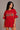 Woman wearing a red 'Friends' themed t-shirt with character illustrations on a plain background