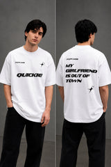 Black QUICKE oversized t-shirt featuring bold white graphic print on the chest and back. Showcasing premium fabric details and relaxed fit. - white