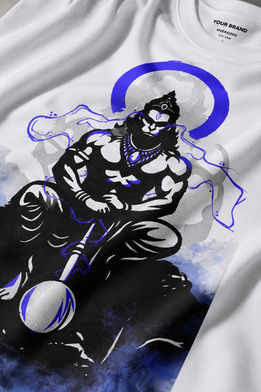 White oversized t-shirt featuring a striking black and blue graphic of Hanuman Dada, with a large blue halo. Designed for a relaxed, streetwear fit.
