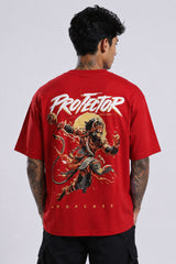 Red oversized t-shirt with 'PROJECTOR HANUMANJI' graphic design of a warrior monkey god and 'POPCASE' logo, worn by a man.