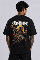 Red oversized t-shirt with 'PROJECTOR HANUMANJI' graphic design of a warrior monkey god and 'POPCASE' logo, worn by a man.