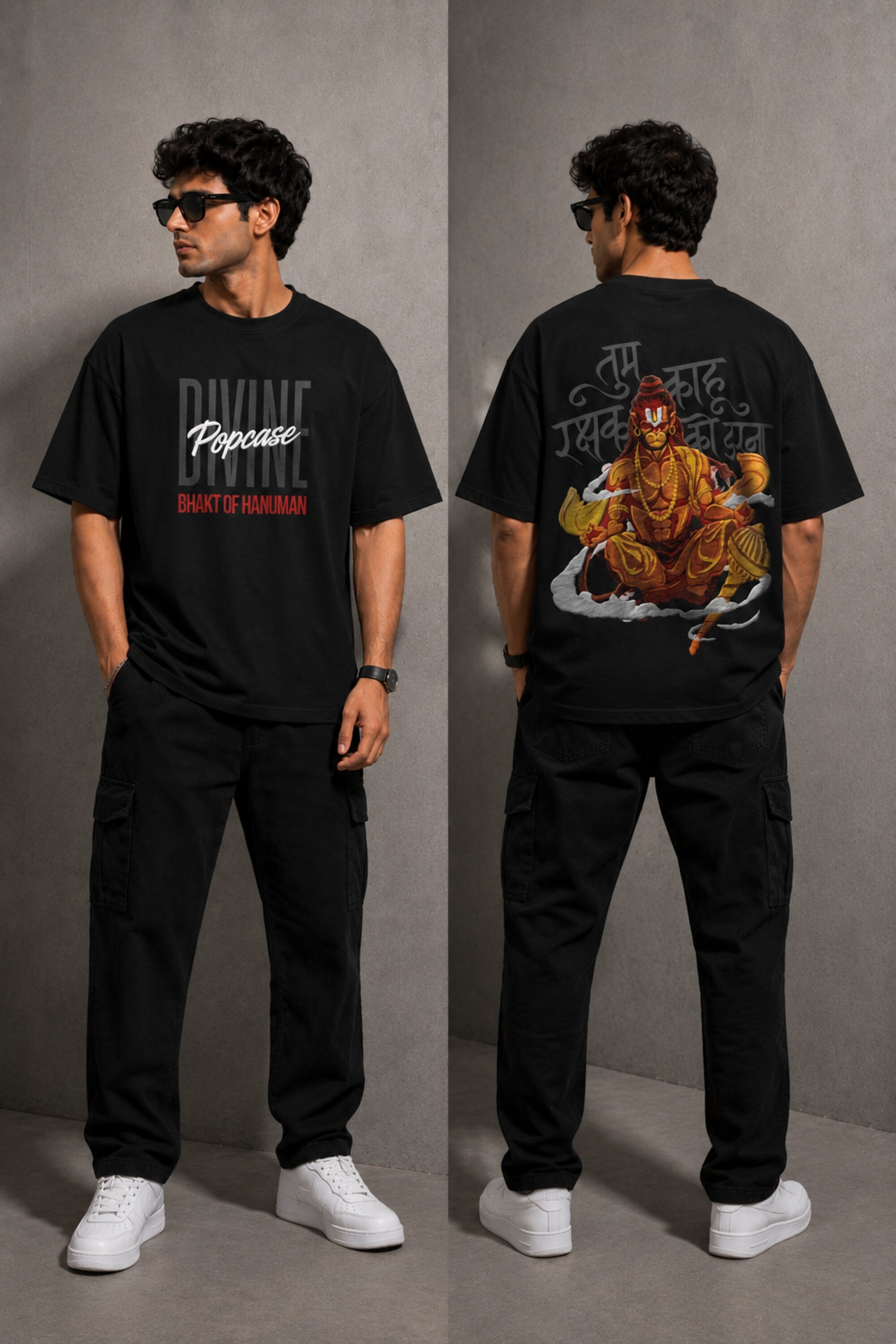 Man wearing a red PROJECTOR HANUMANJI oversized t-shirt with black pants and white sneakers, sitting on metal stairs. - black